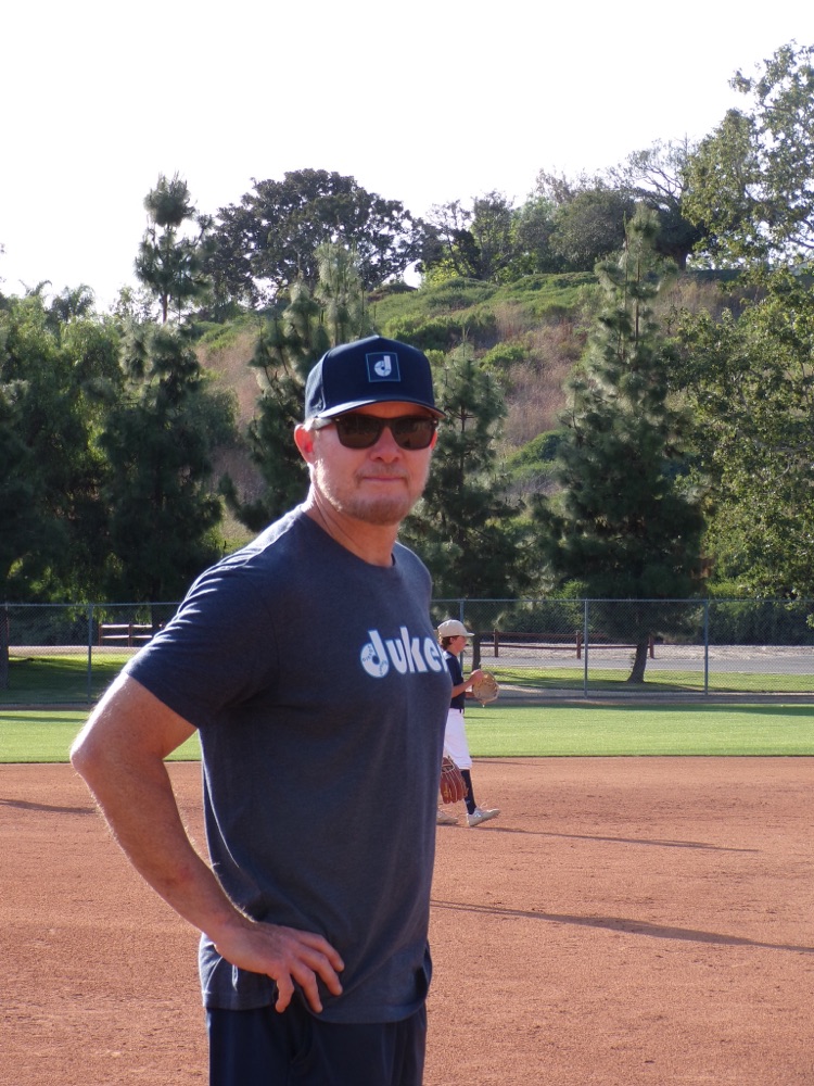 A Dukes coach on the field