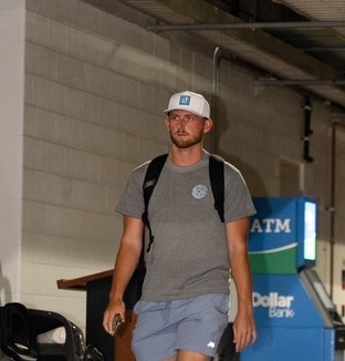 Tanner Bibee wearing a Dukes hat