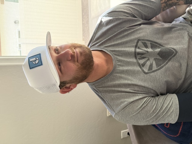 Ben Lively wearing a Dukes hat